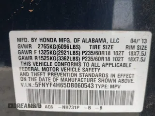 2013 Honda Pilot EX-L with VIN 5FNYF4H65DB060543, listed as a IAAI auction lot 42380911 with 330,452 mi miles and . Bid and sale history available at DreamBid. Image 9.
