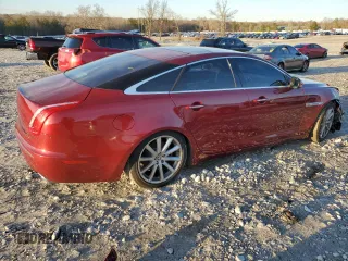 2012 Jaguar XJ with VIN SAJWA1CB3CLV37685, listed as a Copart auction lot 87586005 with 59,885 mi miles and Salvage title. Bid and sale history available at DreamBid. Image 3.
