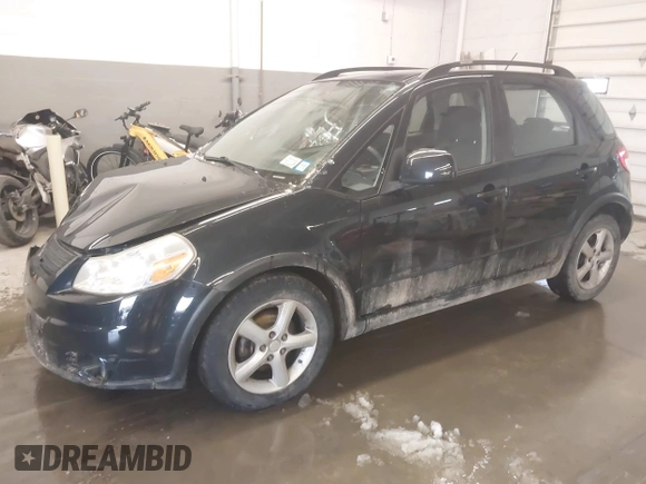 2009 Suzuki SX4 Man AWD with VIN JS2YB413096204911, listed as a IAAI auction lot 41572173 with 84,763 mi miles. Bid and sale history available at carsss.com. Image 2.