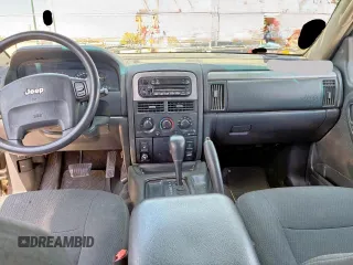 2002 Jeep Grand Cherokee Laredo с VIN 1J4GX48S22C310542, выставлен на аукционе Copart как лот 58444925 с пробегом 160 524 миль миль и Чистый • Clean title. История ставок и продаж доступна на DreamBid. Изображение 9.
