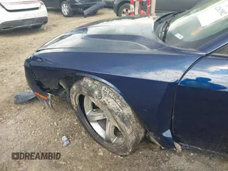 2016 Dodge Challenger SXT with VIN 2C3CDZAG8GH129387, listed as a IAAI auction lot 42262902 with 116,356 mi miles and . Bid and sale history available at DreamBid. Image 6.