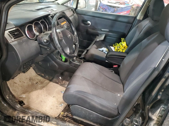 2009 Nissan Versa 1.8 SL with VIN 3N1BC13E39L351372, listed as a Copart auction lot 87274254 with 147,733 mi miles and Salvage Title. Bid and sale history available at carsss.com. Image 7.