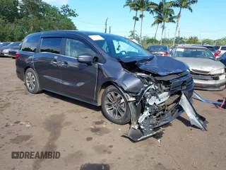2023 Honda Odyssey EX-L with VIN 5FNRL6H65PB002896, listed as a IAAI auction lot 41559502 with 82,390 mi miles. Bid and sale history available at carsss.com. Image 1.