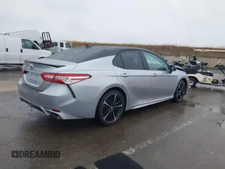 2020 Toyota Camry XSE with VIN 4T1K61AK1LU318098, listed as a IAAI auction lot 41097712 with 64,118 mi miles and . Bid and sale history available at DreamBid. Image 4.