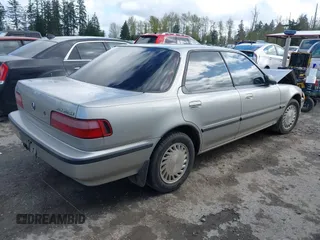 1991 Acura Integra z VIN JH4DB1663MS006848, wystawiony jako IAAI lot #42020171 z przebiegiem 153 978 mil mil oraz . Historia ofert i sprzedaży dostępna na DreamBid. Obrazek 4.