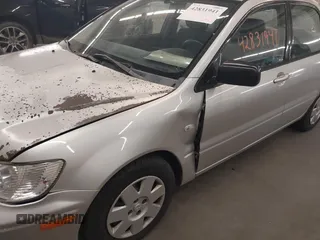 2003 Mitsubishi Lancer ES with VIN JA3AJ26EX3U080807, listed as a IAAI auction lot 42831941 with 156,360 mi miles and . Bid and sale history available at DreamBid. Image 6.