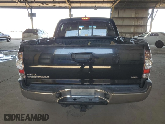 2015 Toyota Tacoma z VIN 3TMLU4EN9FM192716, wystawiony jako Copart lot #61462045 z przebiegiem 103 240 mil mil oraz Szkoda całkowita • Salvage title. Historia ofert i sprzedaży dostępna na DreamBid. Obrazek 6.
