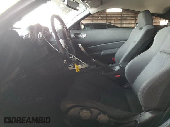 2008 Nissan 350Z Touring z VIN JN1BZ34D28M704964, wystawiony jako Copart lot #82338054 z przebiegiem 81 659 mil mil oraz Szkoda całkowita • Salvage title. Historia ofert i sprzedaży dostępna na DreamBid. Obrazek 7.