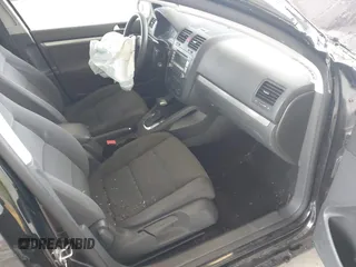 2009 Volkswagen Rabbit S z VIN WVWDB71K59W138874, wystawiony jako IAAI lot #42421953 z przebiegiem 134 616 mil mil oraz . Historia ofert i sprzedaży dostępna na DreamBid. Obrazek 5.