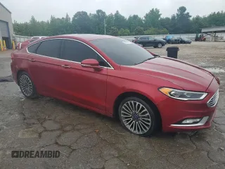2017 Ford Fusion SE z VIN 3FA6P0HD1HR262320, wystawiony jako Copart lot #55850095 z przebiegiem 129 244 mil mil oraz Czysty tytuł • Clean title. Historia ofert i sprzedaży dostępna na DreamBid. Obrazek 4.