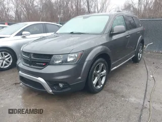 2017 Dodge Journey Crossroad Plus z VIN 3C4PDCGB5HT501363, wystawiony jako IAAI lot #41178334 z przebiegiem 119 076 mil mil oraz . Historia ofert i sprzedaży dostępna na DreamBid. Obrazek 2.