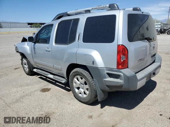 2010 Nissan Xterra S with VIN 5N1AN0NU2AC519838, listed as a Copart auction lot 57301355 with 129,990 mi miles and Salvage title. Bid and sale history available at DreamBid. Image 2.
