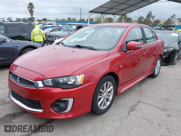 2016 Mitsubishi Lancer ES with VIN JA32U2FU4GU008882, listed as a IAAI auction lot 41600017 with 134,772 mi miles. Bid and sale history available at carsss.com. Image 2.