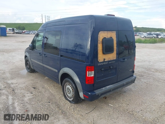2011 Ford Transit Connect XLT with VIN NM0KS9BN2BT070324, listed as a IAAI auction lot 42511234 with 297,422 mi miles and . Bid and sale history available at DreamBid. Image 3.