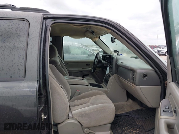 2005 Chevrolet Tahoe Z71 z VIN 1GNEC13T05R232584, wystawiony jako IAAI lot #42478633 z przebiegiem Nie podano mil oraz . Historia ofert i sprzedaży dostępna na DreamBid. Obrazek 5.