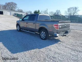 2013 Ford F-150 XL with VIN 1FTFW1CT5DFA98921, listed as a IAAI auction lot 41789209 with 272,201 mi miles. Bid and sale history available at carsss.com. Image 3.