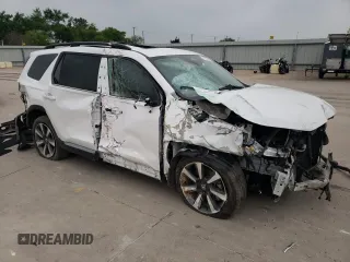 2023 Honda Pilot Elite z VIN 5FNYG1H81PB045653, wystawiony jako Copart lot #51252065 z przebiegiem 57 388 mil mil oraz Szkoda całkowita • Salvage title. Historia ofert i sprzedaży dostępna na DreamBid. Obrazek 4.