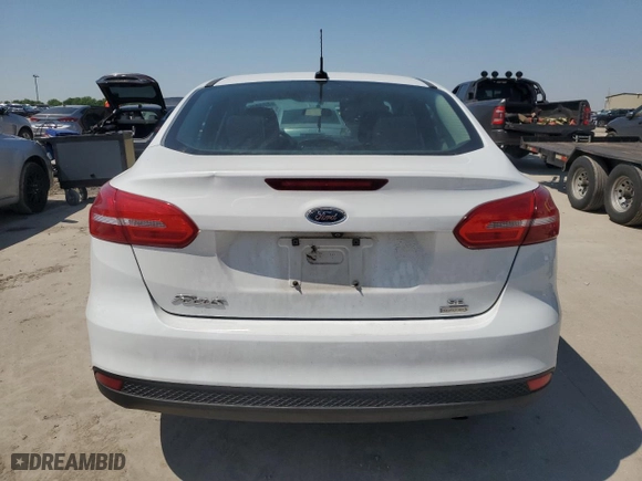 2018 Ford Focus SE with VIN 1FADP3FE6JL293572, listed as a Copart auction lot 52300545 with 96,308 mi miles and Clean Title. Bid and sale history available at carsss.com. Image 6.