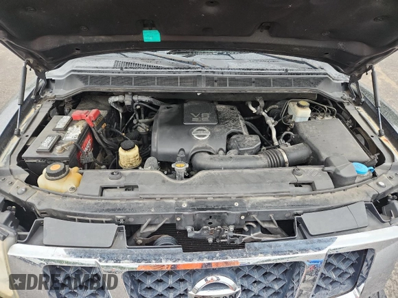 2010 Nissan Armada Titanium z VIN 5N1BA0ND0AN619506, wystawiony jako Copart lot #58329005 z przebiegiem 212 496 mil mil oraz Szkoda całkowita • Salvage title. Historia ofert i sprzedaży dostępna na DreamBid. Obrazek 12.