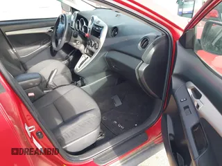 2009 Pontiac Vibe with VIN 5Y2SM67009Z401692, listed as a IAAI auction lot 41769199 with 143,904 mi miles. Bid and sale history available at carsss.com. Image 5.