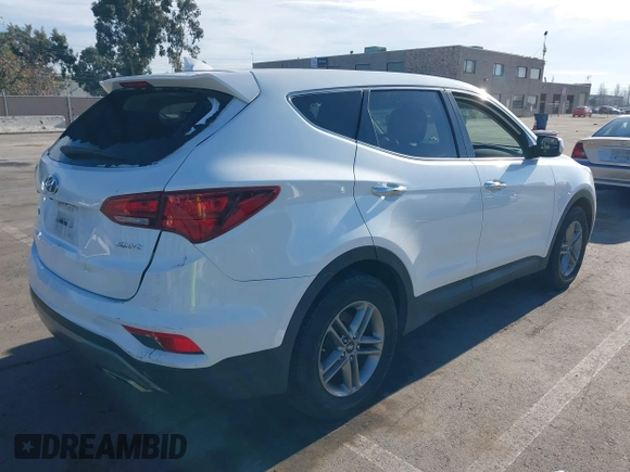2017 Hyundai Santa Fe 2.4L z VIN 5XYZT3LB2HG383765, wystawiony jako IAAI lot #38642722 z przebiegiem 76 420 mil mil oraz . Historia ofert i sprzedaży dostępna na DreamBid. Obrazek 4.