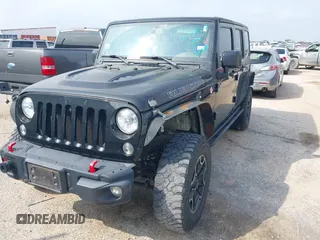 2015 Jeep Wrangler Unlimited Rubicon z VIN 1C4BJWFG2FL572417, wystawiony jako IAAI lot #41895927 z przebiegiem 54 981 mil mil oraz . Historia ofert i sprzedaży dostępna na DreamBid. Obrazek 2.