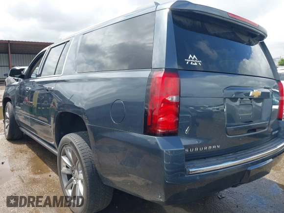 2019 Chevrolet Suburban Premier z VIN 1GNSCJKC0KR139323, wystawiony jako IAAI lot #42100758 z przebiegiem Nie podano mil oraz . Historia ofert i sprzedaży dostępna na DreamBid. Obrazek 3.