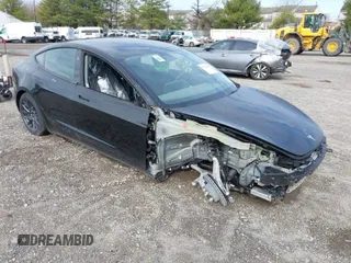 2025 Tesla Model 3 Long Range with VIN 5YJ3E1EB4SF938120, listed as a IAAI auction lot 41799491 with 3 mi miles and . Bid and sale history available at DreamBid. Image 1.