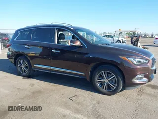 2019 Infiniti QX60 Pure with VIN 5N1DL0MM4KC569307, listed as a IAAI auction lot 42300605 with 40,336 mi miles and . Bid and sale history available at DreamBid. Image 14.