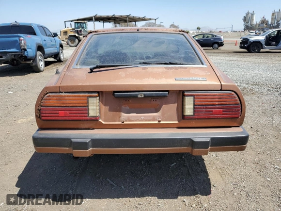 1982 Datsun 280ZX z VIN JN1HZ04S0CX433451, wystawiony jako Copart lot #53912864 z przebiegiem 200 629 mil mil oraz Tytuł czysty. Historia ofert i sprzedaży dostępna na DreamBid. Obrazek 6.