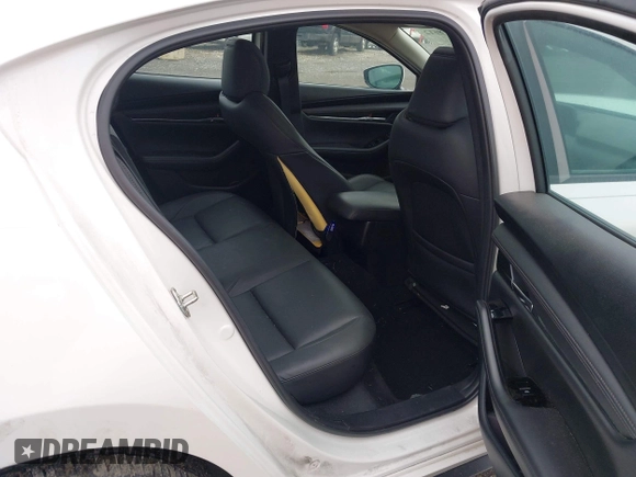 2021 Mazda 3 Preferred z VIN 3MZBPBCL0MM250862, wystawiony jako IAAI lot #42318612 z przebiegiem 86 056 mil mil oraz . Historia ofert i sprzedaży dostępna na DreamBid. Obrazek 8.