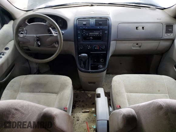 2005 Kia Sedona LX with VIN KNDUP132656723226, listed as a Copart auction lot 52886115 with 0 mi miles and Salvage Title. Bid and sale history available at carsss.com. Image 8.