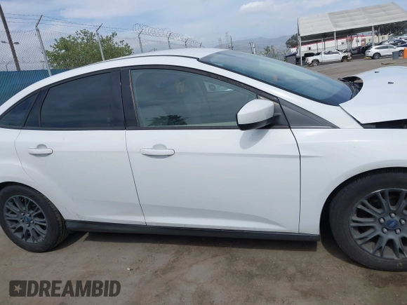 2012 Ford Focus SE с VIN 1FAHP3F2XCL121264, выставлен на аукционе IAAI как лот 42243139 с пробегом 189 442 миль миль и . История ставок и продаж доступна на DreamBid. Изображение 14.