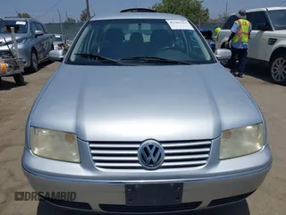 2004 Volkswagen Jetta GL z VIN 3VWRA69M34M031594, wystawiony jako IAAI lot #42565161 z przebiegiem 191 011 mil mil oraz . Historia ofert i sprzedaży dostępna na DreamBid. Obrazek 6.