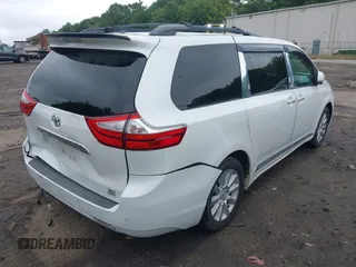 2015 Toyota Sienna Limited with VIN 5TDDK3DCXFS103594, listed as a IAAI auction lot 42515466 with 96,684 mi miles and . Bid and sale history available at DreamBid. Image 4.