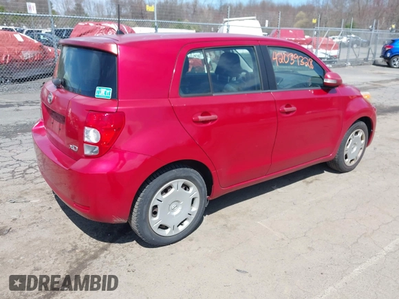 2008 Scion xD with VIN JTKKU104X8J027713, listed as a IAAI auction lot 42039328 with 217,720 mi miles. Bid and sale history available at carsss.com. Image 4.