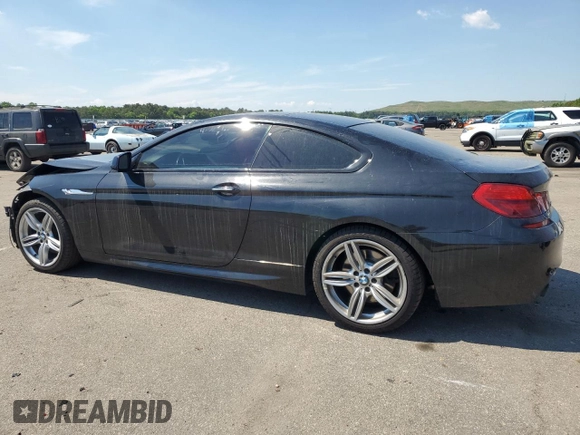 2015 BMW 6 Series z VIN WBALY1C57FDZ73541, wystawiony jako Copart lot #57294034 z przebiegiem 136 357 mil mil oraz Czysty tytuł • Clean title. Historia ofert i sprzedaży dostępna na DreamBid. Obrazek 2.