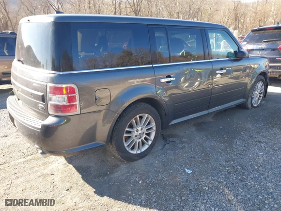 2016 Ford Flex SEL with VIN 2FMGK5C89GBA23210, listed as a IAAI auction lot 41617724 with 133,582 mi miles. Bid and sale history available at carsss.com. Image 4.
