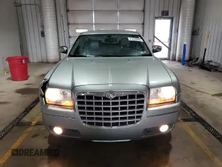 2005 Chrysler 300 with VIN 2C3JA53G65H556313, listed as a Copart auction lot 51839305 with 124,358 mi miles and Salvage Title. Bid and sale history available at carsss.com. Image 5.