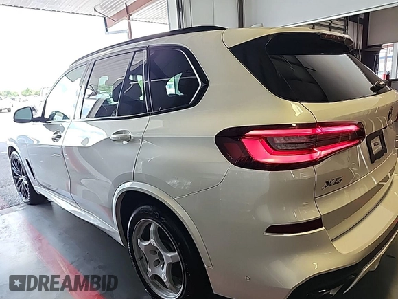 2023 BMW X5 xDrive40i with VIN 5UXCR6C00P9R65110, listed as a IAAI auction lot 42635441 with 32,227 mi miles and . Bid and sale history available at DreamBid. Image 10.