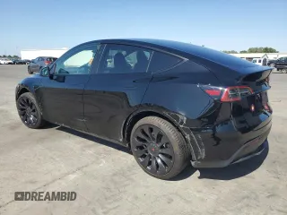 2023 Tesla Model Y Long Range z VIN 7SAYGAEE7PF859030, wystawiony jako Copart lot #58965185 z przebiegiem 18 421 mil mil oraz Czysty tytuł • Clean title. Historia ofert i sprzedaży dostępna na DreamBid. Obrazek 2.