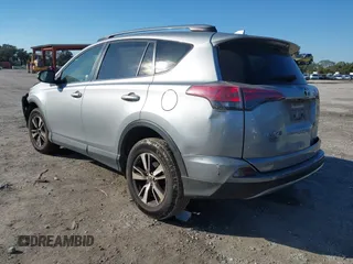 2018 Toyota RAV4 XLE with VIN JTMWFREV7JD125119, listed as a IAAI auction lot 41841021 with 132,659 mi miles and . Bid and sale history available at DreamBid. Image 3.