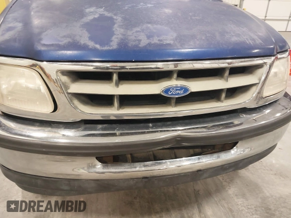 1997 Ford F-150 with VIN 1FTDF1767VKC52713, listed as a IAAI auction lot 42212161 with 136,306 mi miles and . Bid and sale history available at DreamBid. Image 13.