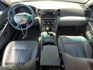 2005 Jeep Grand Cherokee Laredo z VIN 1J4GR48KX5C581833, wystawiony jako Copart lot #60975355 z przebiegiem 149 993 mil mil oraz Szkoda całkowita • Salvage title. Historia ofert i sprzedaży dostępna na DreamBid. Obrazek 8.