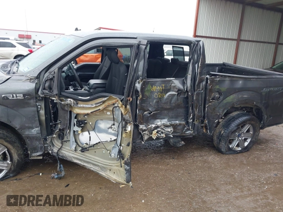 2019 Ford F-150 XL with VIN 1FTEW1C56KKC31025, listed as a IAAI auction lot 41452618 with 153,422 mi miles and . Bid and sale history available at DreamBid. Image 6.