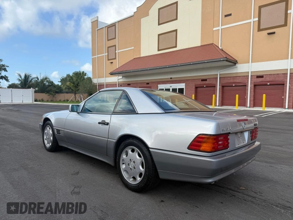 1994 Mercedes-Benz SL with VIN WDBFA63E0RF094472, listed as a Copart auction lot 54659615 with 55,706 mi miles and Clean title. Bid and sale history available at DreamBid. Image 3.