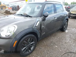 2011 MINI Countryman S with VIN WMWZC5C53BWM11022, listed as a IAAI auction lot 42249403 with 173,718 mi miles and . Bid and sale history available at DreamBid. Image 6.