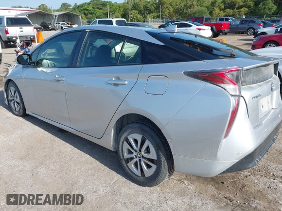 2017 Toyota Prius Two z VIN JTDKARFU8H3046058, wystawiony jako IAAI lot #42169692 z przebiegiem 79 226 mil mil oraz . Historia ofert i sprzedaży dostępna na DreamBid. Obrazek 3.