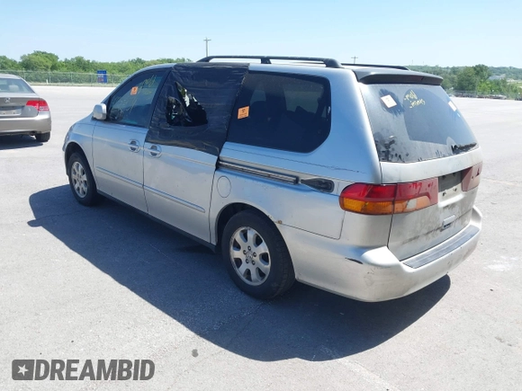 2004 Honda Odyssey EX-L with VIN 5FNRL18064B027350, listed as a IAAI auction lot 42281754 with Not provided miles and . Bid and sale history available at DreamBid. Image 3.