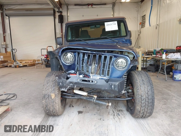 2003 Jeep Wrangler Sport with VIN 1J4FA49S53P311822, listed as a IAAI auction lot 41621710 with 156,023 mi miles. Bid and sale history available at carsss.com. Image 12.